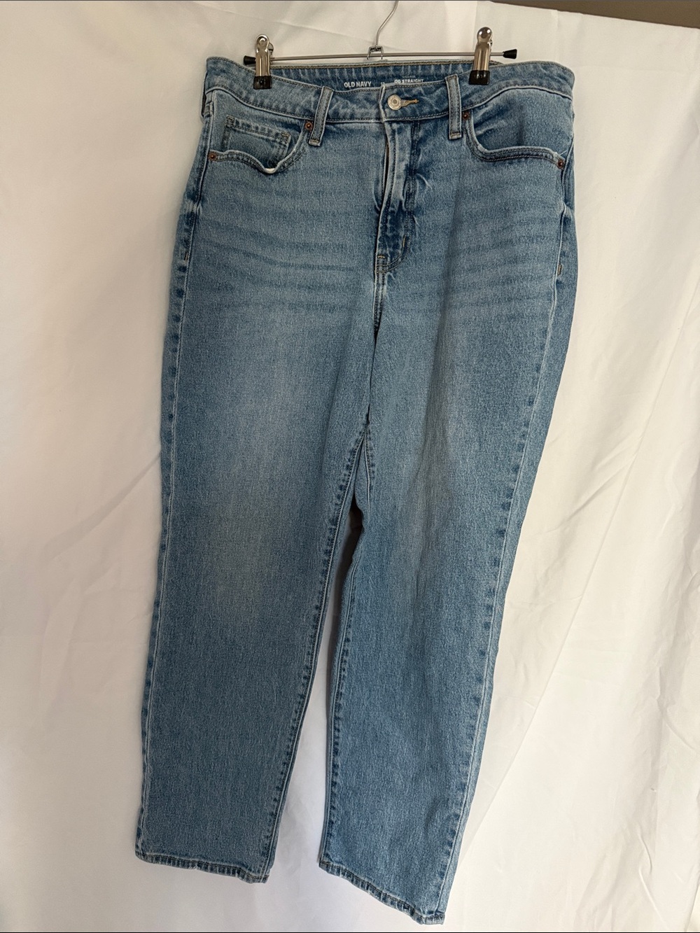 Old Navy OG Straight high rise Jeans. Distressing on back pockets and legs.